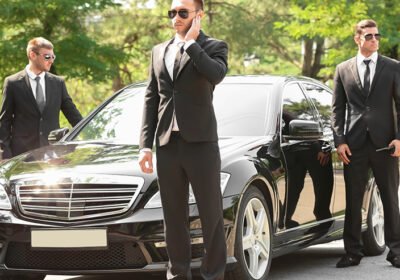 handsome-bodyguards-near-car-outdoors